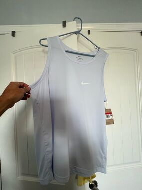 Mens NWT Nike Dri fit tank. Brand new, no rips, stains, tears. Never worn